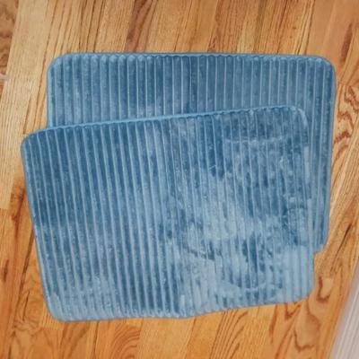 2 THICK BATH RUGS AND SOME TOILETRIES