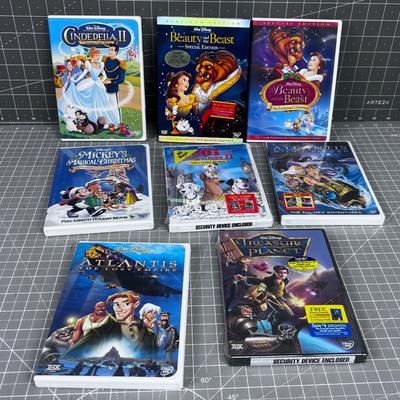 8 Disney DVD's - About half new SEALED