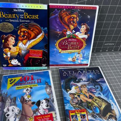 8 Disney DVD's - About half new SEALED