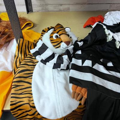 Lions and Tiger and OH MY a Weird Blow up in a Court Jester Costume thing. 
