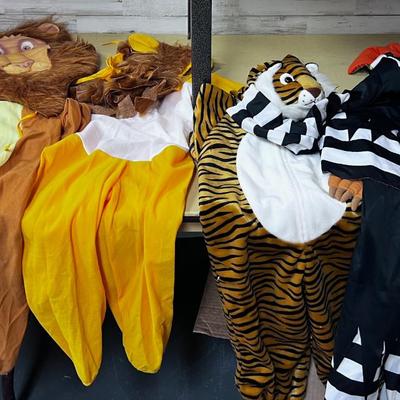 Lions and Tiger and OH MY a Weird Blow up in a Court Jester Costume thing. 