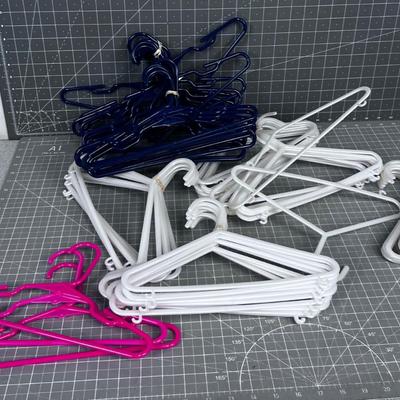 70 NEW Plastic Child Size Hangers 