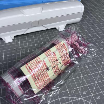 Kitchen Wrap Master and Pamper Chef Cake Decorator. 