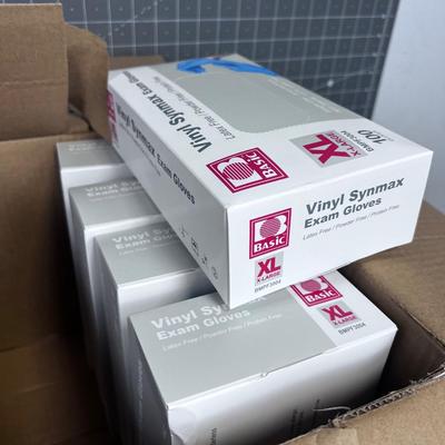 5 Boxes of Vinal Exam Gloves. 