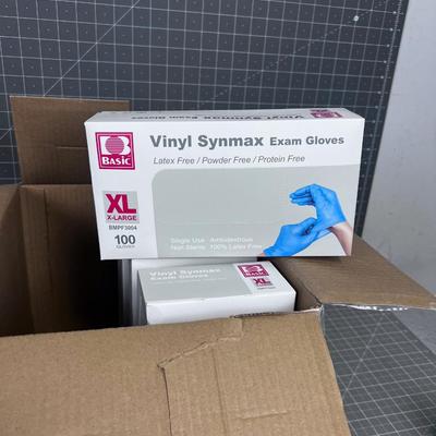 5 Boxes of Vinal Exam Gloves. 