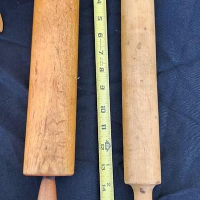 Kitchen wooden utensils, rolling pens, and salt. pepper