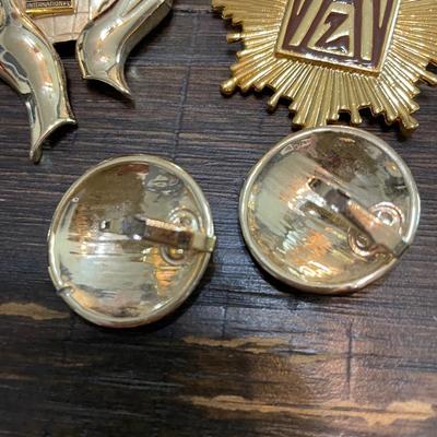 Zonta pins and earrings