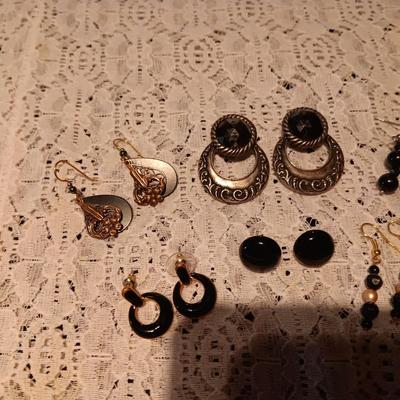 BLACK AND SILVER-TONE PIERCED EARRINGS