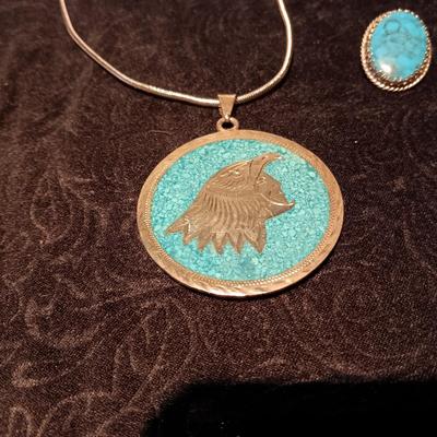 HECHO MEXICO STERLING MEDALLION ON A CHAIN AND TURQUOISE COLORED EARRINGS
