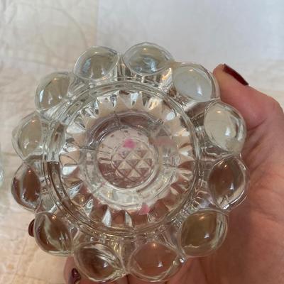 2 glass candlesticks