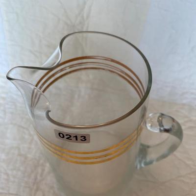 MCM pitcher with gold highlights