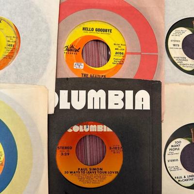 THE BEATLES TOGETHER AND ON THEIR OWN VINYL 45's