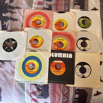 THE BEATLES TOGETHER AND ON THEIR OWN VINYL 45's