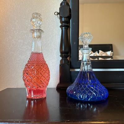 2 GLASS DECANTERS W/COLORED WATER