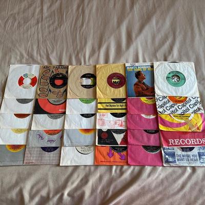 AN ASSORTMENT OF MUSIC ON VINYL 45's