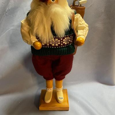 Santa golfer nutcracker
