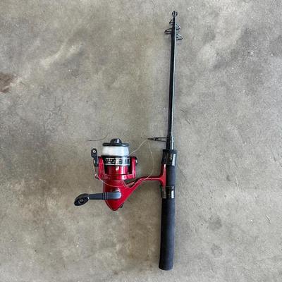 2 FISHING POLES W/REELS, 2 POLE TUBES AND A NYLON BAG