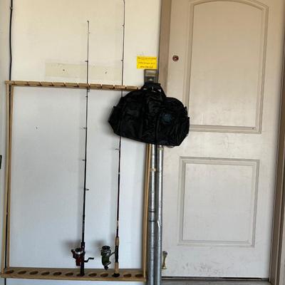 2 FISHING POLES W/REELS, 2 POLE TUBES AND A NYLON BAG