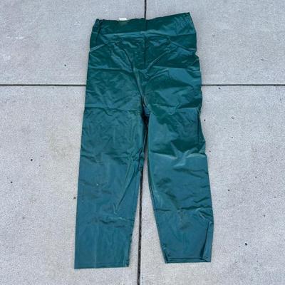 BIBBED RAIN PANTS, FISHING POLES, POLE HOLDER AND TUBE