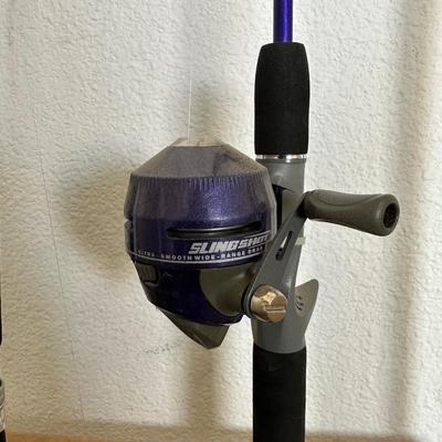 2 FISHING POLES W/REELS AND A FISH GAFF