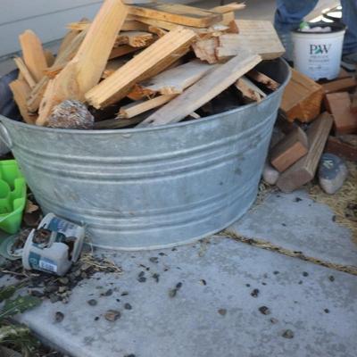 Pile of wood, and bucket