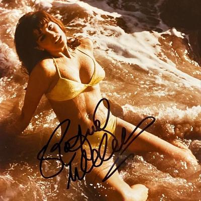 Raquel Welch signed photo. GFA Authenticated