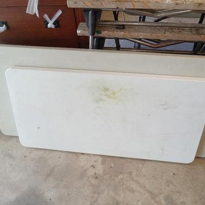 4 plastic tables