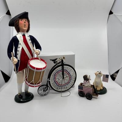 1065 Byers Choice Drummer with Bicycle , and Two Dogs