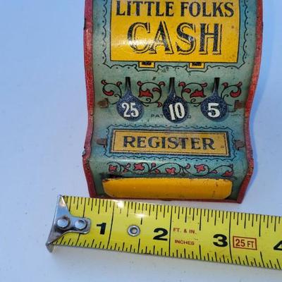 Decor lot, including Tin Toy Nursery Rhymes Gropper Coin