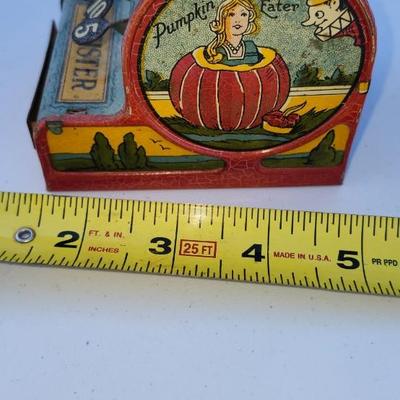Decor lot, including Tin Toy Nursery Rhymes Gropper Coin