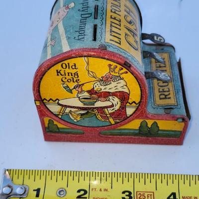 Decor lot, including Tin Toy Nursery Rhymes Gropper Coin