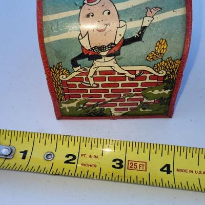 Decor lot, including Tin Toy Nursery Rhymes Gropper Coin