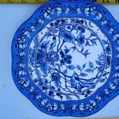 Blue and white ceramic with flower and bird design decorative plates