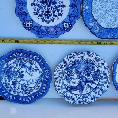 Blue and white ceramic with flower and bird design decorative plates