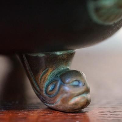 NORSE POTTERY TRI FOOTED BOWL W/ MAN O WIND DECOR.
