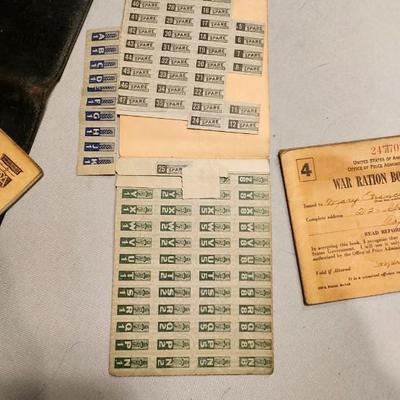 Three War Ration Book Four with Stamps.
