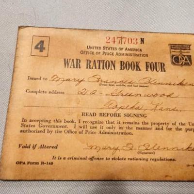 Three War Ration Book Four with Stamps.