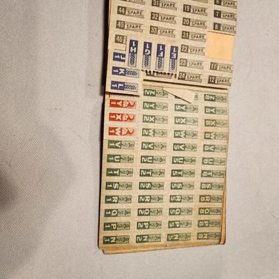 Three War Ration Book Four with Stamps.