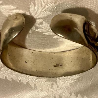 Siam Sterling silver cuff bracelet has green insets