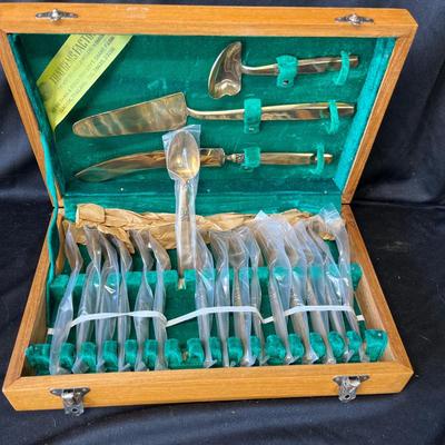 Lot 235 Brass flatware set