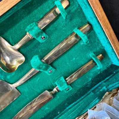 Lot 235 Brass flatware set