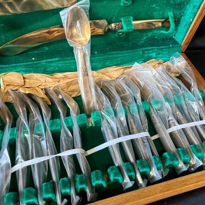 Lot 235 Brass flatware set