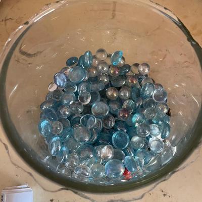 Glass vase full of glass beads