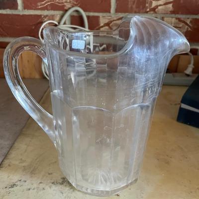 Ribbed glass pitcher
