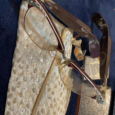 Old wallets,glasses and butterflies