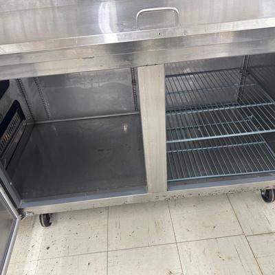 Lot 12: - Large refrigerated food prep table