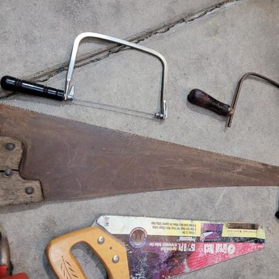 Sale Photo Thumbnail #575: I didn't even try to start the chainsaw. I was wishing I had the movie to add to this lot.
Have a wood cutting party, invite your friends.
Garage