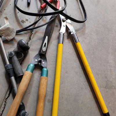 Lot of yard items and jumper cables