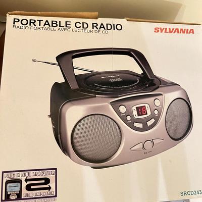 Electronics Lot - CD Radio, Ear Buds, Digital Frame, Power Bank
