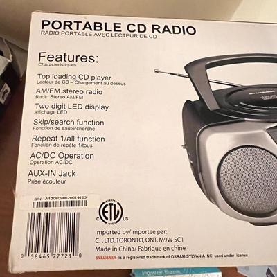 Electronics Lot - CD Radio, Ear Buds, Digital Frame, Power Bank